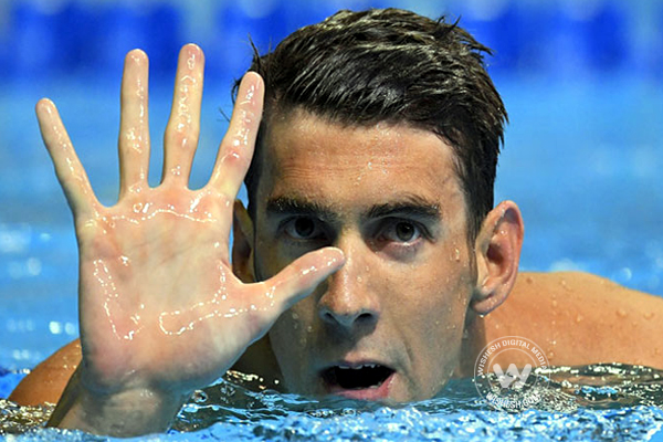 Michael Phelps winning five gold