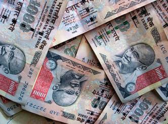 Rupee falls 21 paise against USD