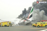 Dubai, fire, flash news emirates airlines crash lands in dubai, Flash