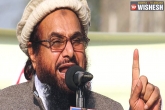 Terrorist organisation JuD's chief Hafiz Saeed, Hizbul Mujahideen supreme commander Syed Salahuddin, designated terrorist saeed warns on rajnath s arrival in pakistan, Home minister rajnath singh