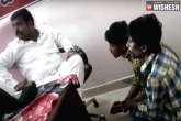 Cheating, youth beaten, jagadish reddy confirms the man in the video is not a trs mla, Beaten