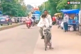 Shobhram news, Shobhram cycles, madhya pradesh man cycles for 105 km for his son s examination, Madhya pradesh man