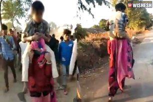 MP Woman forced to carry a Boy on her Shoulders for leaving her Husband
