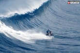 Robbie Madison bike ride, Robbie Madison bike ride on water, nail biting bike ride on pacific ocean, Ocean