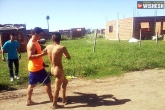 world news, Viral videos, man stripped naked after caught raping a minor, Strip