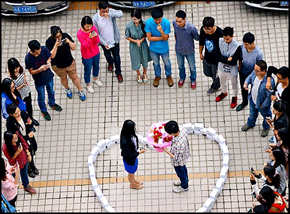 Man Proposes with 99 iPhones